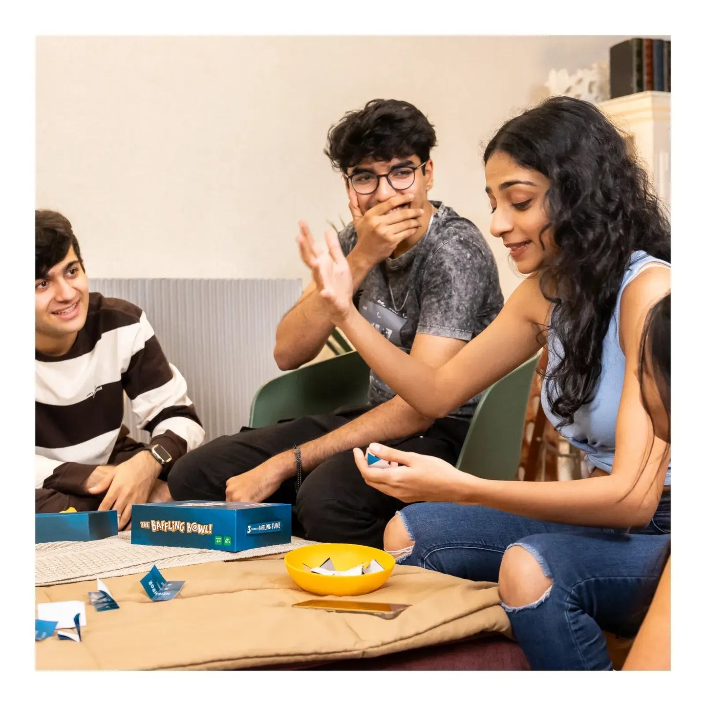 Board game with players for The Baffling Bowl age 10 and up