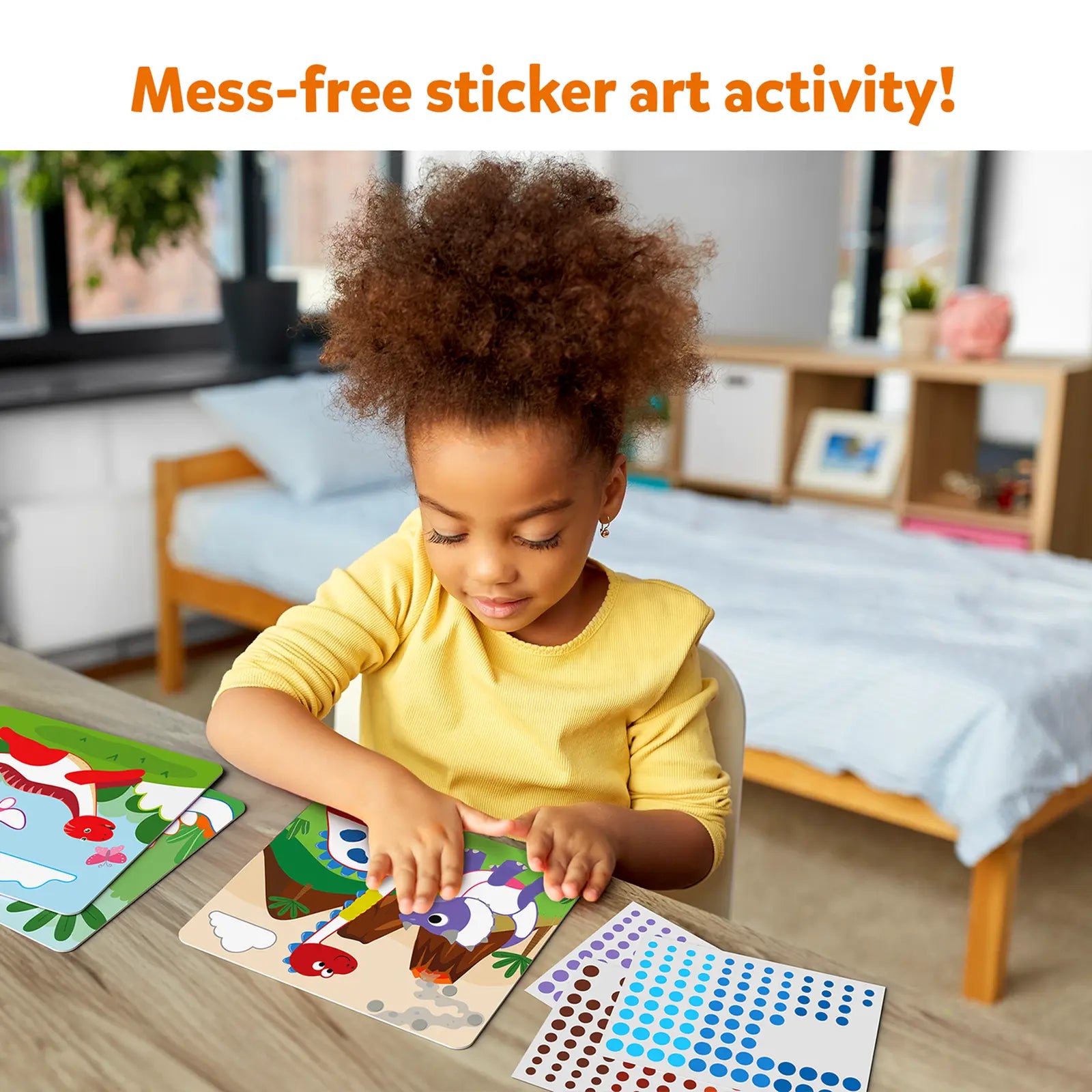 Child’s sticker art activity with dinosaur-themed stickers from Dot it World of Dinosaurs