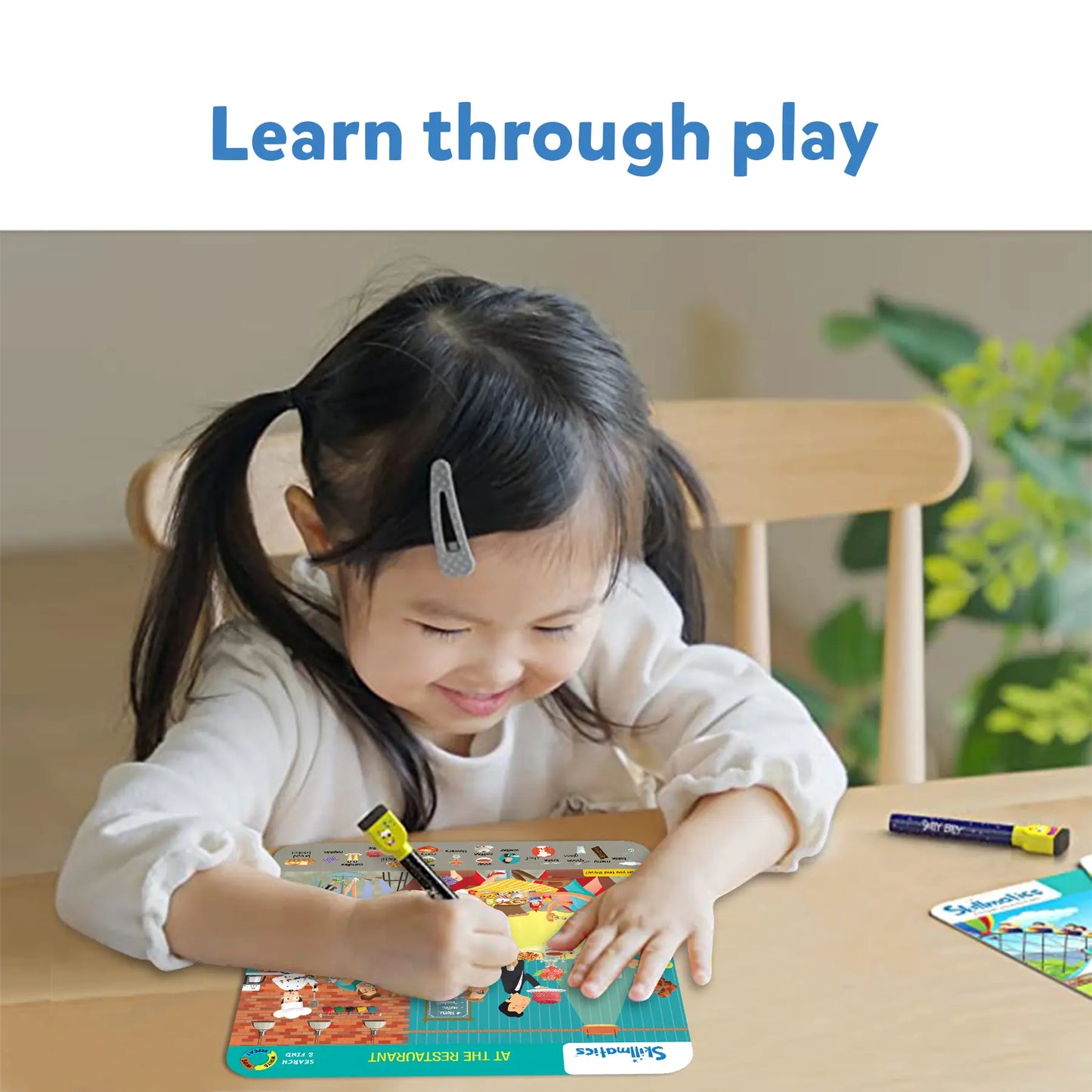 Child’s drawing activity on Skillmatics Search and Find Reusable Activity Mats for ages 3 to 6