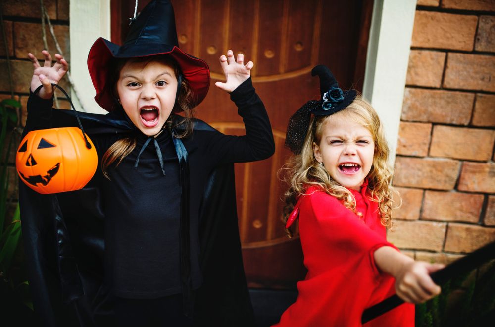 Kids dressed up in Halloween costumes