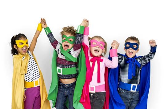 children cheering each other with superhero costumes and masks
