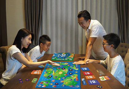 Family Playing guess in 10 board game