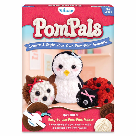 Skillmatics PomPals craft kit packaging for ages 9+, featuring three finished yarn animals: a hedgehog, penguin and ladybug. The box highlights the pom-pom maker and includes yarn, with text explaining that children can create and style their own pom-pom animals.