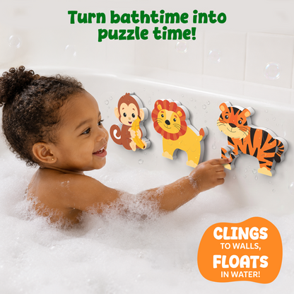 A smiling child enjoys bath time while placing colorful foam animal puzzles on a tiled bathtub wall. The monkey, lion, and tiger puzzles stick securely to the wet surface, surrounded by bubbles. Text highlights that the puzzles cling to walls, float in water, and turn bath time into engaging puzzle play.