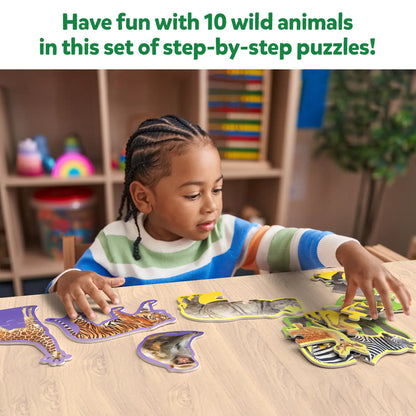 Child playing with wild animals puzzle from Step By Step Puzzle Wild Animals for ages 3+