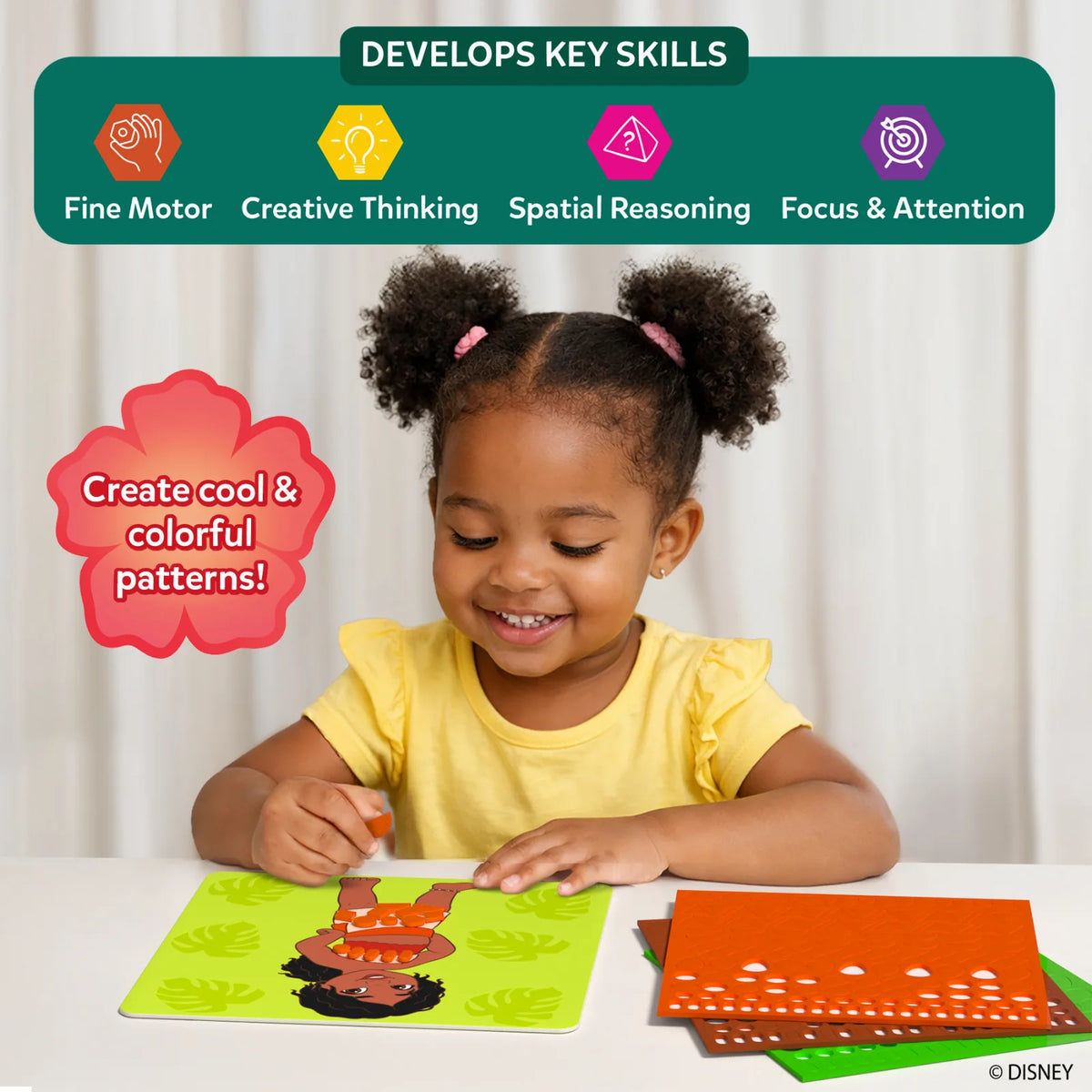 Smiling girl in a yellow top pressing orange foam stickers onto a green young Moana picture board, beside stacked orange, brown and green sticker sheets. A flower badge reads Create cool and colorful patterns; a banner lists Fine Motor, Creative Thinking, Spatial Reasoning, Focus and Attention.