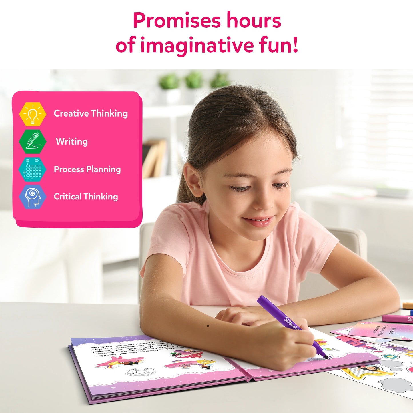 Girl drawing in a pink-themed activity book from My Storybook Art Kit Unicorns & Princesses