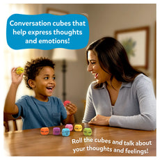 Woman and child playing with conversation cubes at a table