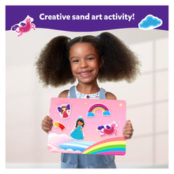 Smiling girl holding a pink Sand-Tastic Art Unicorns & Princesses sand art board