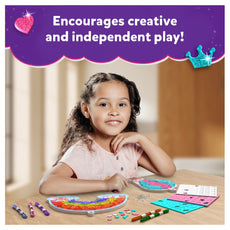 Young girl playing with Super Strings Unicorn Magic craft set for kids ages 6-12